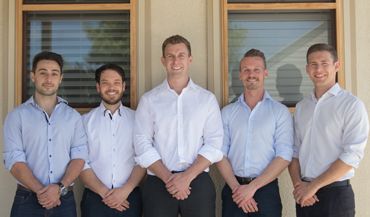 Chiropractors from the Chiropractic Health and Wellness Center standing side by side